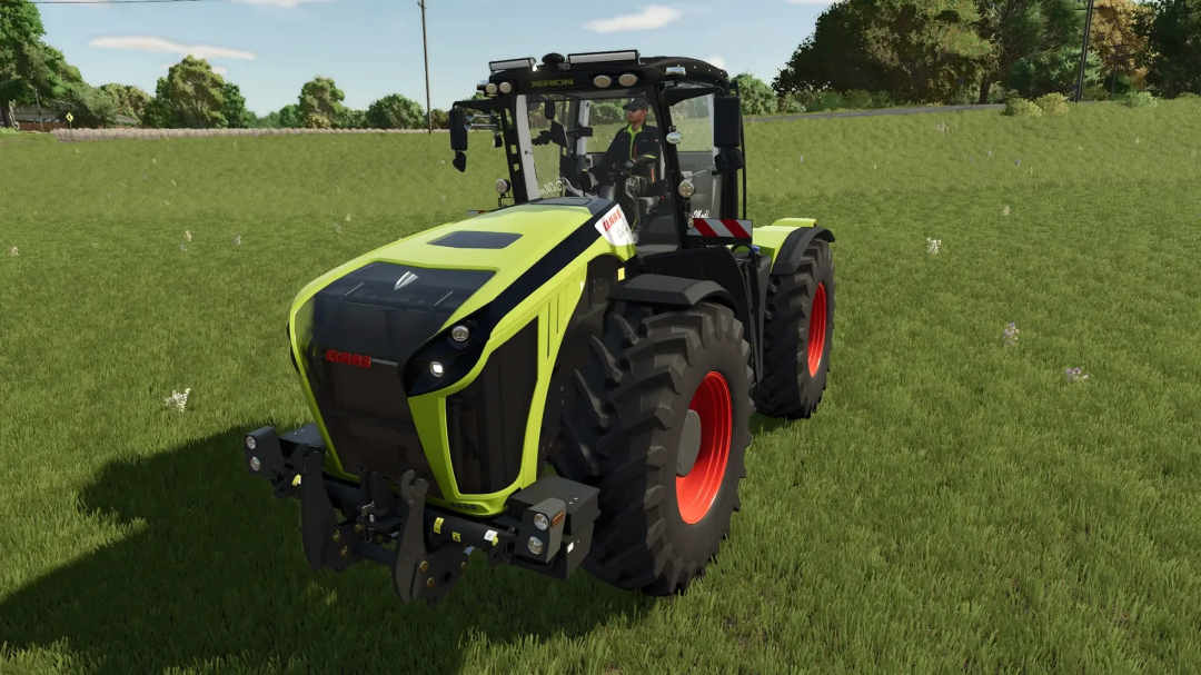 Claas XERION 5000 Special tractor mod in FS25 on a grassy field.