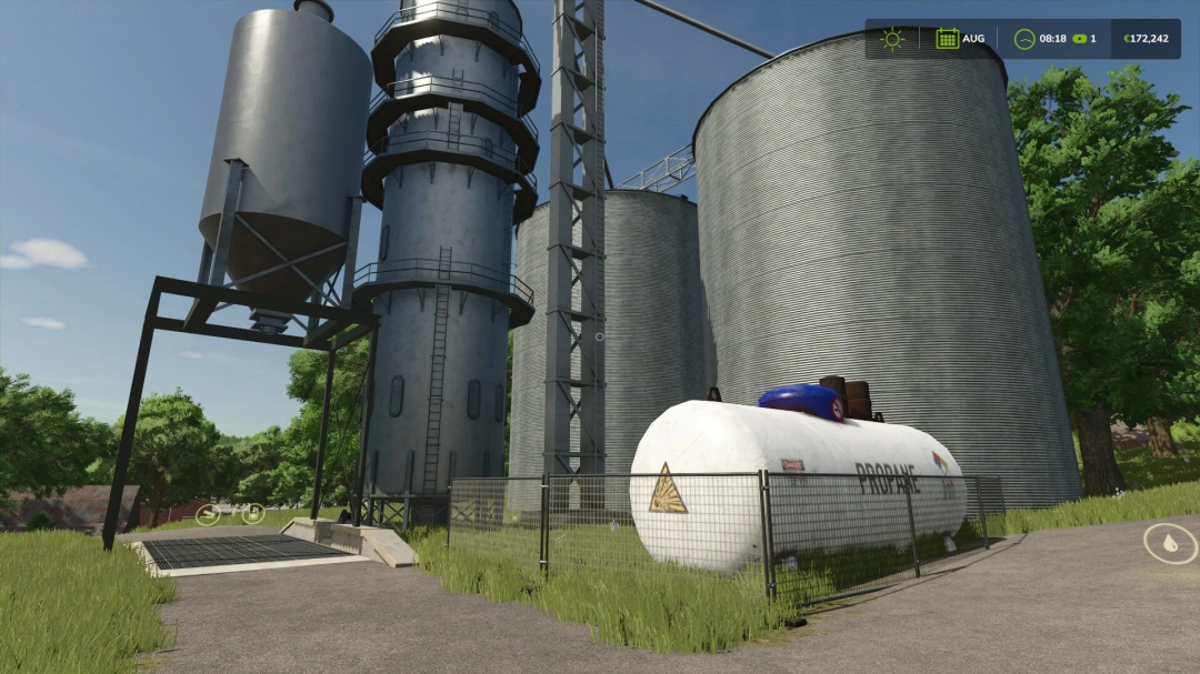 FS25 mod Corn Dryer v1.0.0.0 showcases large silos and machinery in Farming Simulator 25.