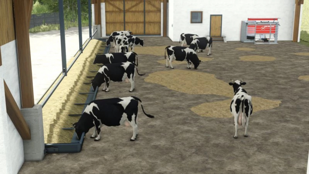 FS25 German Cow Barn mod showing cows in a barn interior with feeding troughs in Farming Simulator 25.