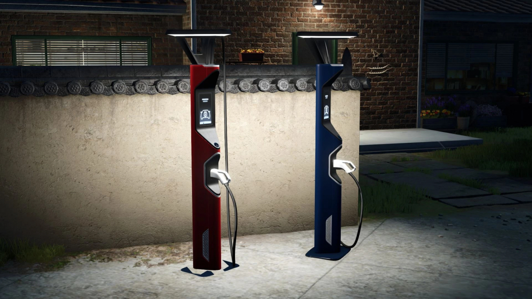 FS25 Fast charging station v1.0.0.0 mod featuring red and blue electric charging units against a stone wall.