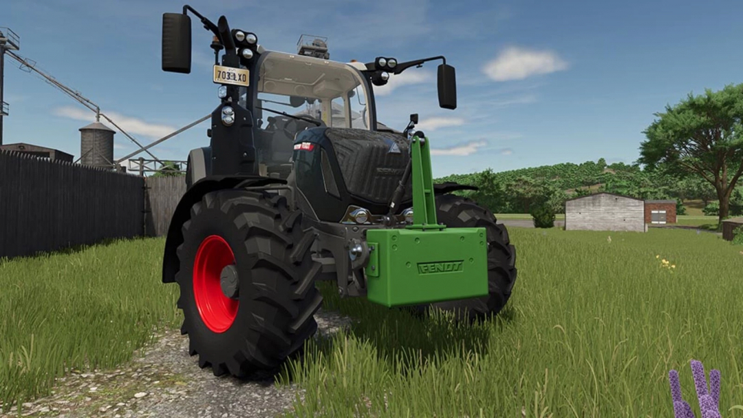 Fendt tractor with Weights Pack mod on grass in FS25. Farming Simulator 25 mod features green weights attached to the front.