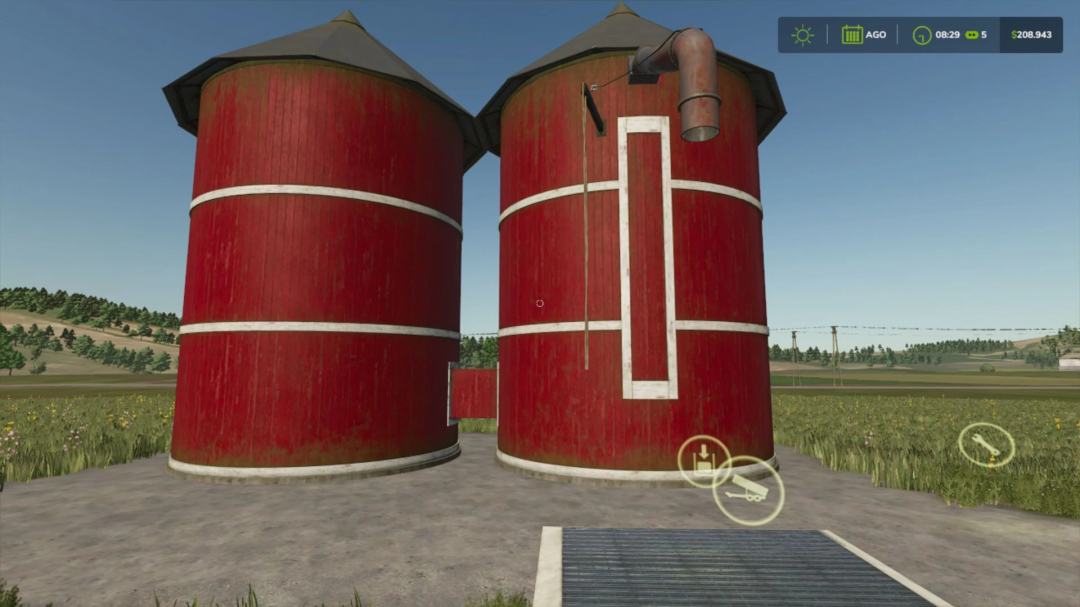 FS25 mod Fermenter Silo v1.1.0.0 featuring two large red silos in a grassy field, enhancing farming technology in Farming Simulator 25.