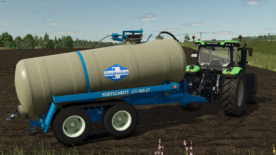 FS25 mods, HTS Pack v1.2.0.0 showing Fortschritt HTS 100.27 tanker hitched to a tractor in Farming Simulator 25.