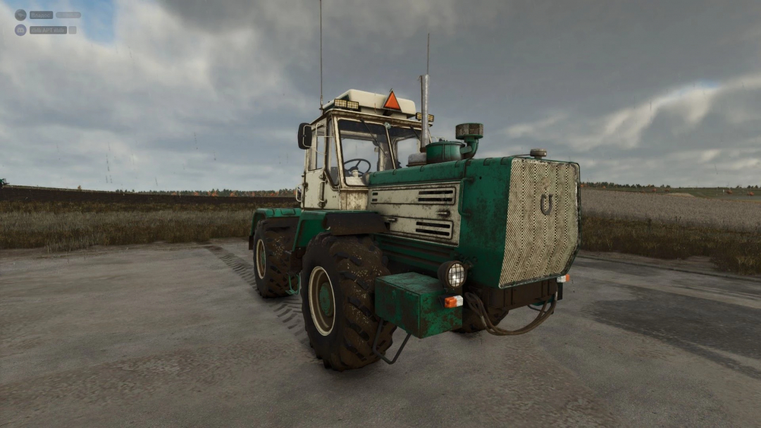 HTZ T 150K V8 tractor mod in FS25, showcasing a vintage green design on farmland.