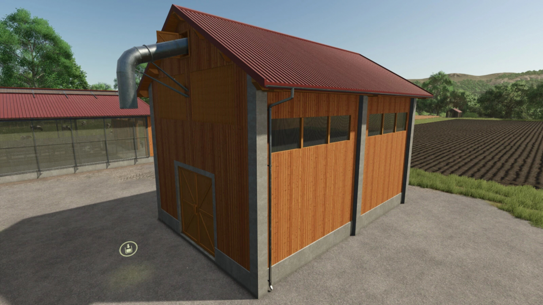 FS25 mod Hay Storage And Ventilation v1.0.0.0 showing a wooden barn with metal pipes under clear skies.