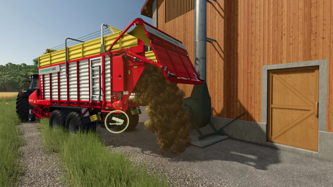 FS25 mod showing hay unloading from red trailer into storage facility with ventilation system.