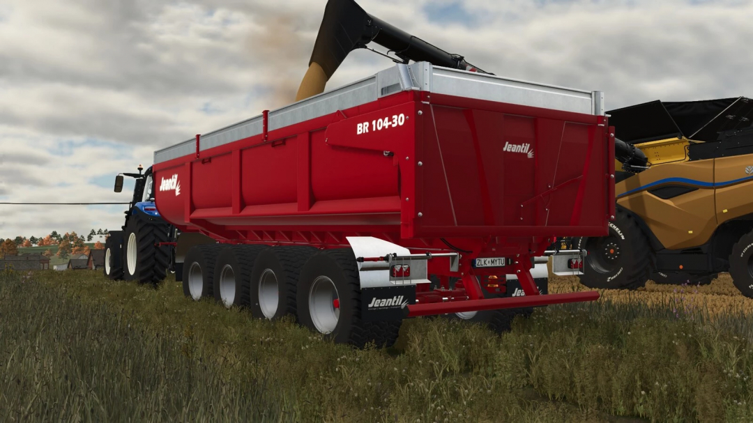 FS25 mod Jeantil BR 104-30 in field. Farming Simulator 25 mod with red trailer attached to tractor.