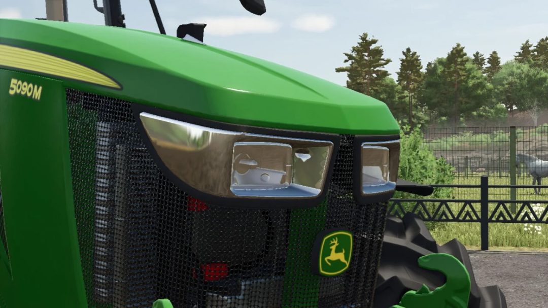 Close-up of front grille and headlights of John Deere 5M Series mod in FS25.