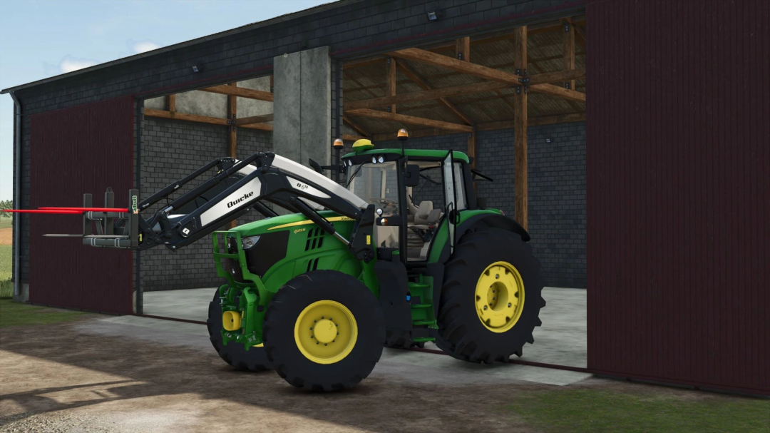 John Deere 6M Large Series tractor mod in FS25 near a barn.