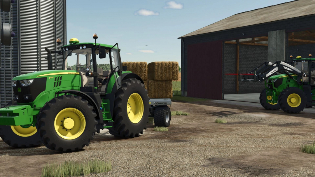 John Deere 6M Large Series v1.0.0.0 mod in Farming Simulator 25, showcasing tractors and hay bales near a barn.