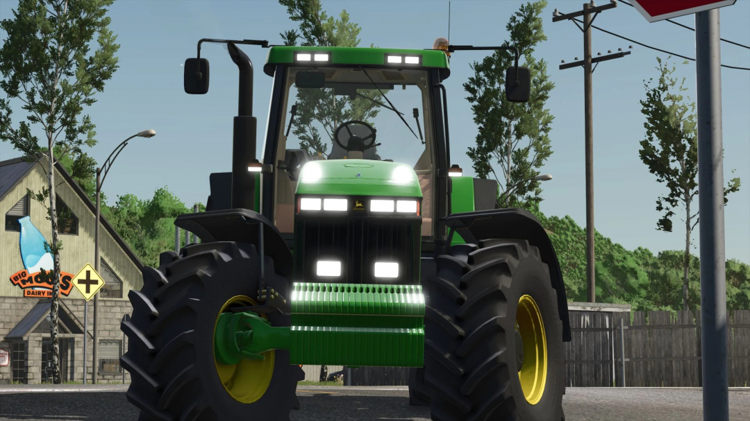 Front view of John Deere 8000 Series mod in Farming Simulator 25, displayed on a road with trees and buildings.