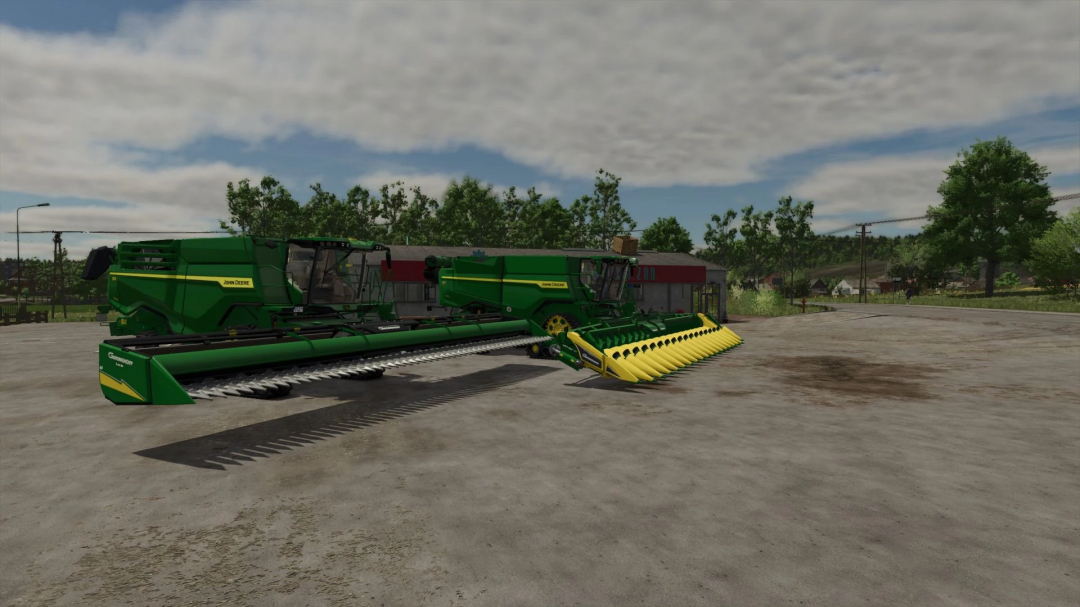 John Deere Harvesting Pack mod in FS25 featuring green combines on a farm.