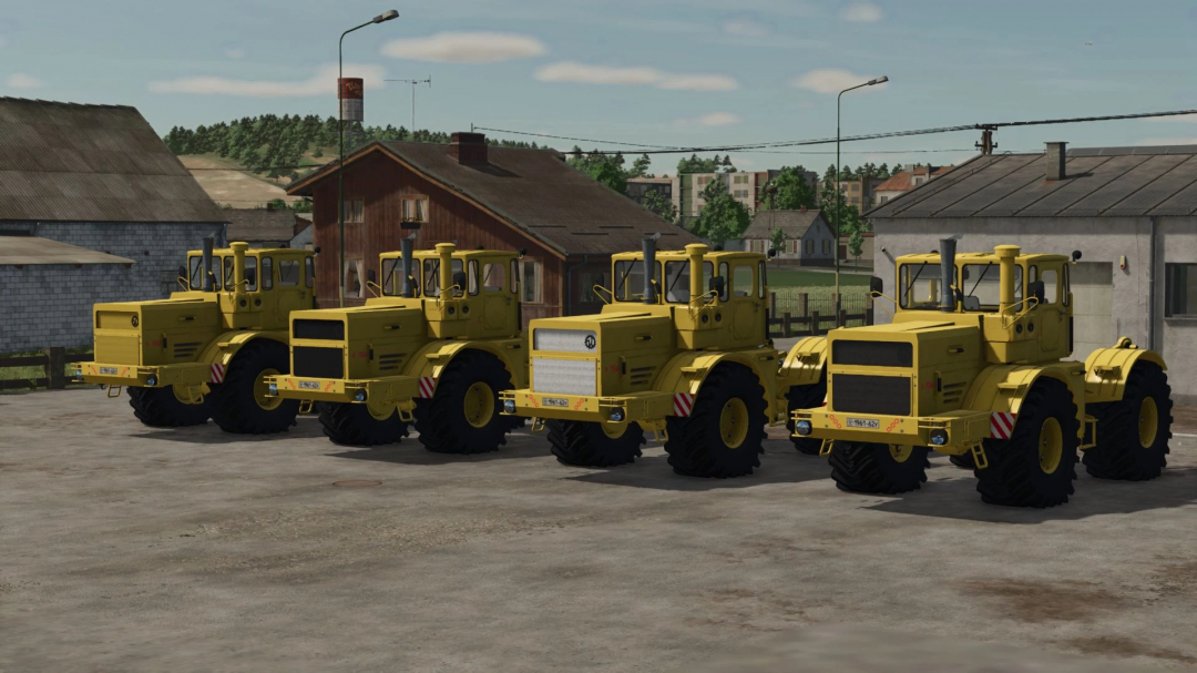 Four yellow Kirovets tractors in FS25 mod parked in a farm setting.