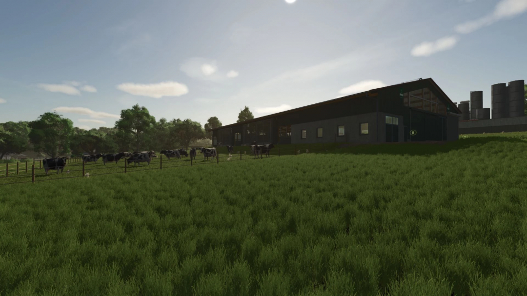 FS25 mod, Larger animal stables v1.0.0.0, features a vast grassy field with cows grazing near a modern barn in Farming Simulator 25.