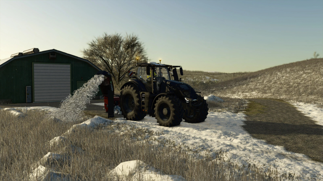 FS25 mods: Lizard 262 Monster snow blower clearing snow by a green barn in Farming Simulator 25.