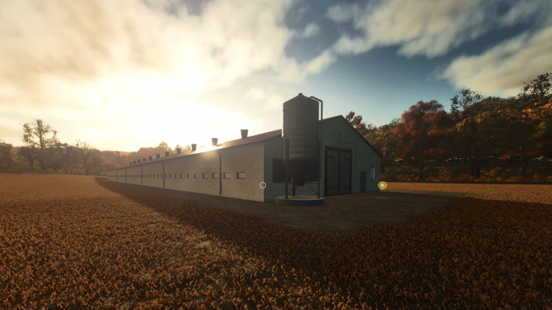 Sunset view of Long Chicken Barn mod in FS25, featuring a large barn and silo in a field.