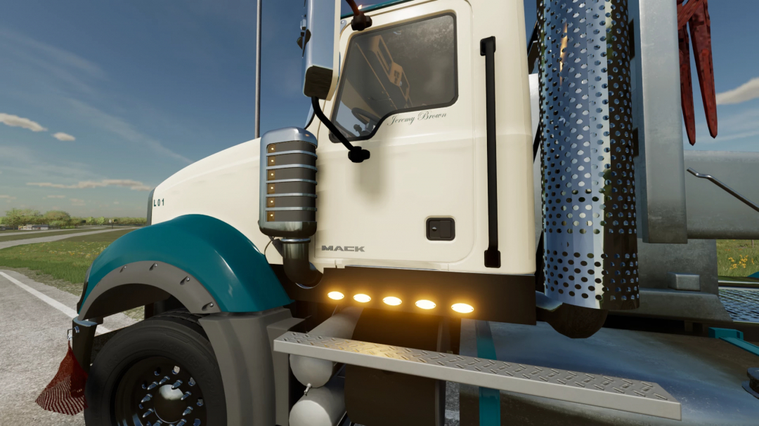 Close-up of Mack Titan truck mod in FS22 with detailed exterior features.