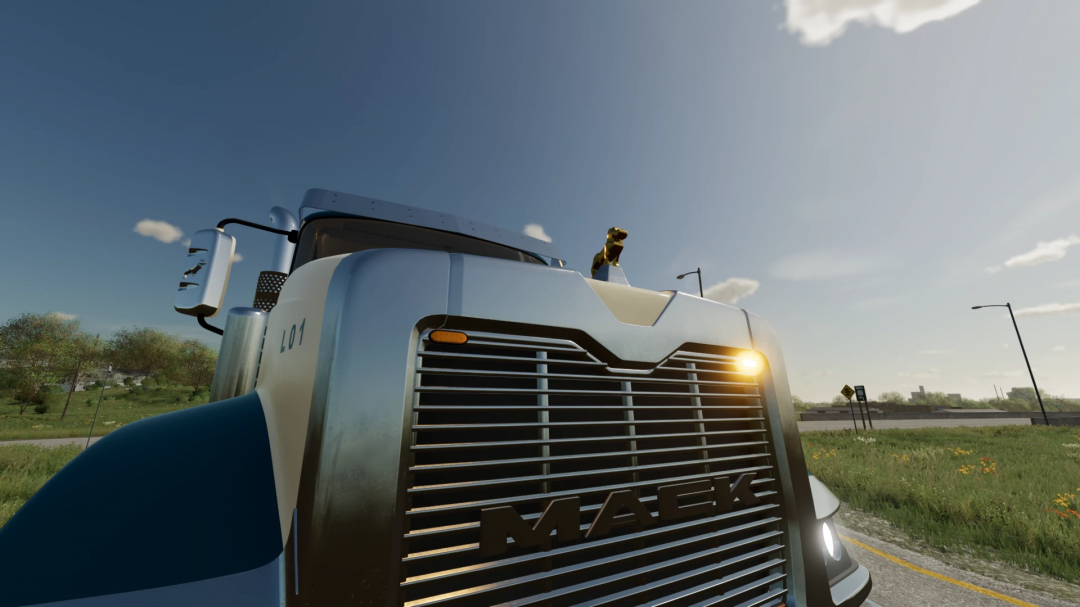 Close-up of Mack Titan truck mod in FS22, showcasing detailed front grille design.