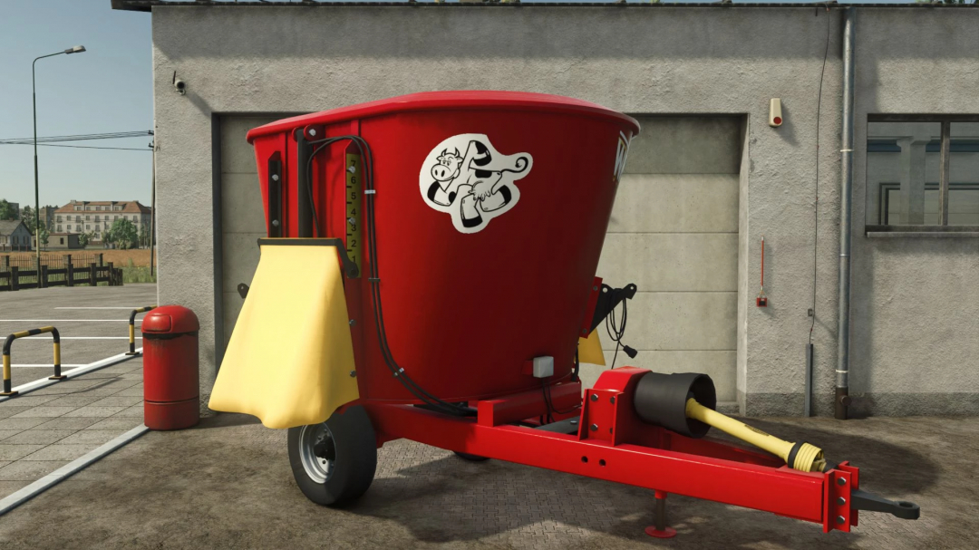 FS25 mod Metaltech WP 6 v1.0.0.0 mixer wagon, red and yellow, beside a garage.