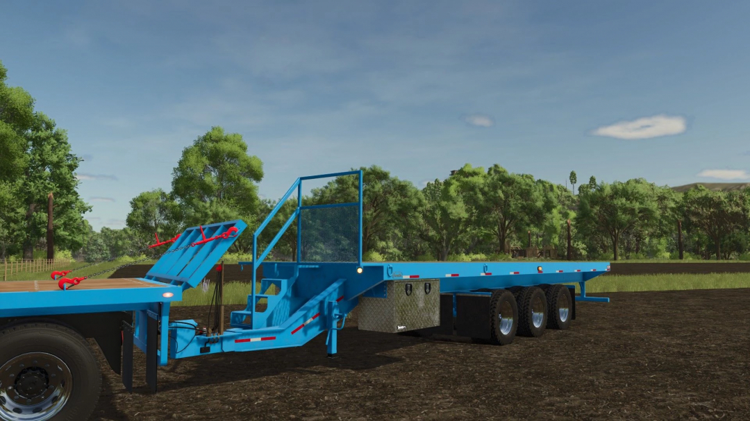 Blue Pacsetter FlatBed trailer mod for FS25 parked on a farm.