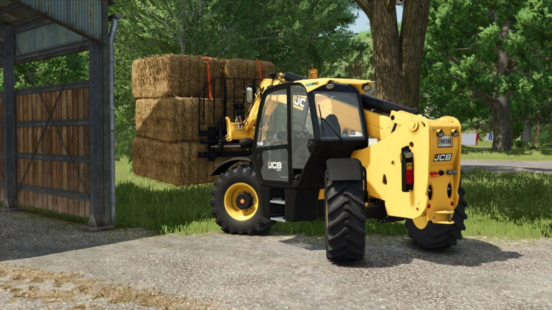 FS25 Pallet Fork mod lifting hay bales with a JCB loader in Farming Simulator 25.