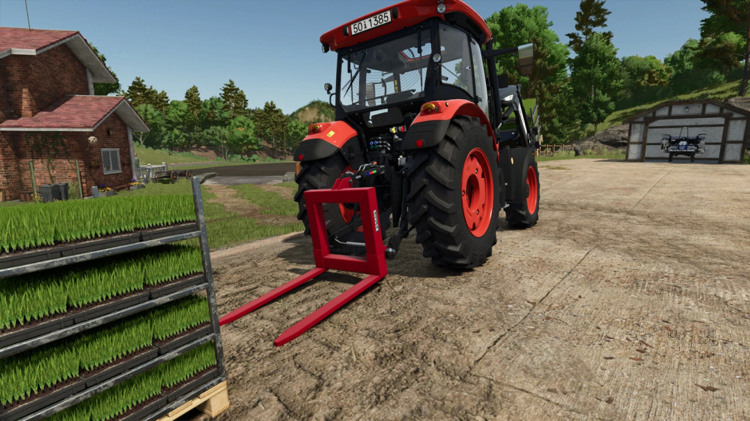 A tractor with a Peecon PD 1500 mod in FS25, featuring red forks, near grass pallets on a farm.