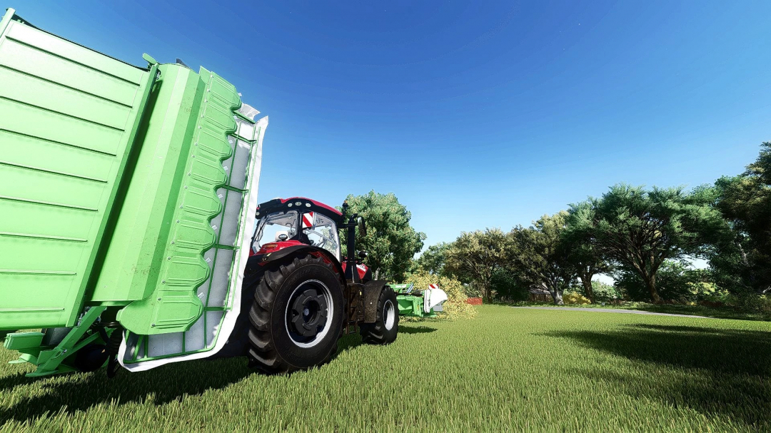 FS25 mod Shader MKSHV1 v1.1.0.0 features a red tractor and green trailer in a lush field under a clear blue sky in Farming Simulator 25.