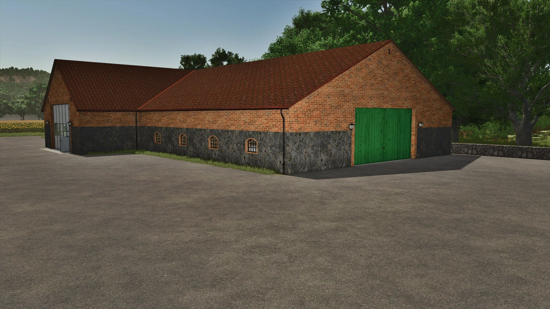 Stone barn with workshop for FS25 mod, featuring brick walls and green doors, set in a rural landscape.