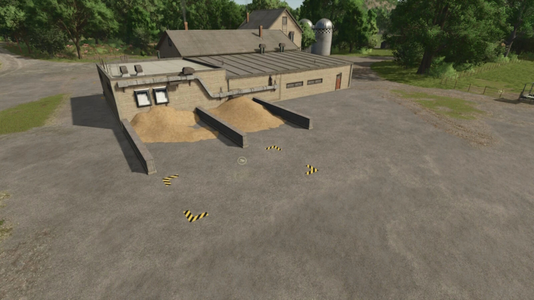 FS25 Unload Zones Pack v1.0.0.0 mod, featuring a concrete building with multiple unloading zones and storage areas in Farming Simulator 25.