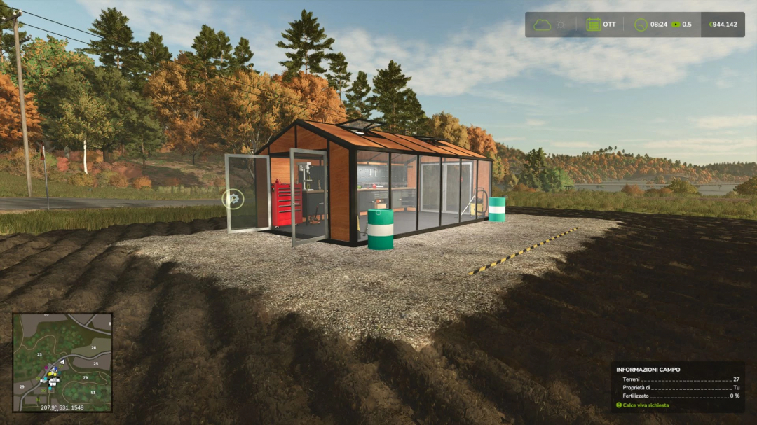 FS25 mod Workshop v1.0.0.0, a modern garage in a lush landscape, enhancing Farming Simulator 25 gameplay.