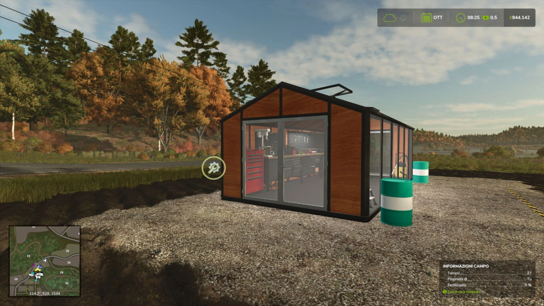 Wooden workshop mod in FS25 with tools and barrels, set in an autumn forest landscape.