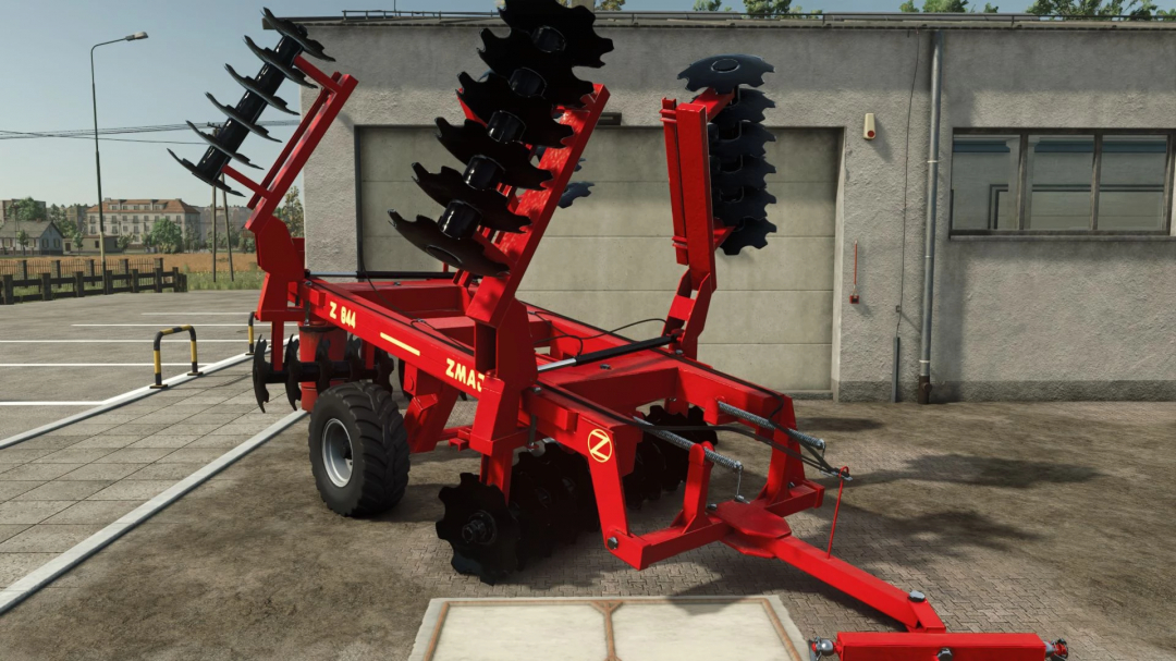 Zmaj Z844 farming equipment mod in FS25, featuring a bright red disc harrow design.