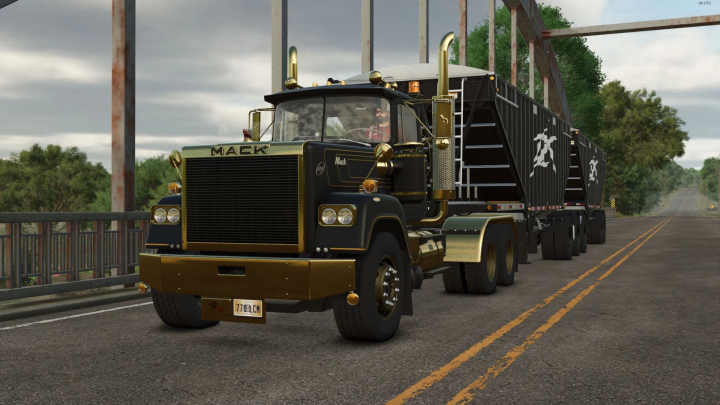 fs25-mods,  1979 Superliner truck mod in FS25, black and gold design, on a bridge.