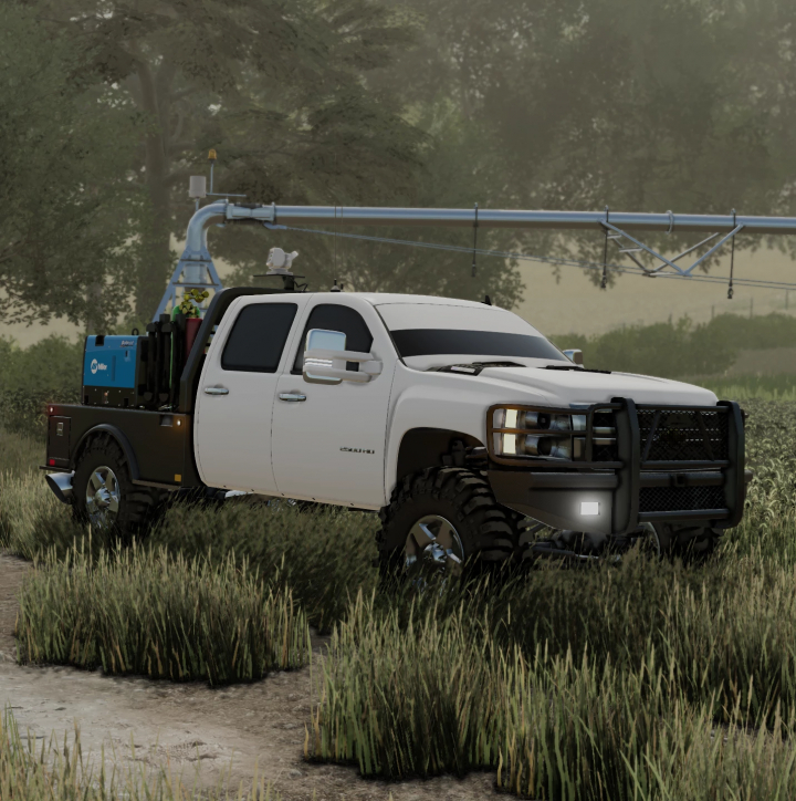 fs22-mods,  2010 Duramax 2500 mod for Farming Simulator 22 parked in a field with tools in the truck bed.