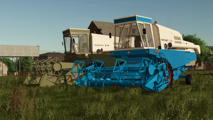 fs25-mods,  FS25 mods image featuring Fortschritt E-512 & E-514 harvesters in a field setting.