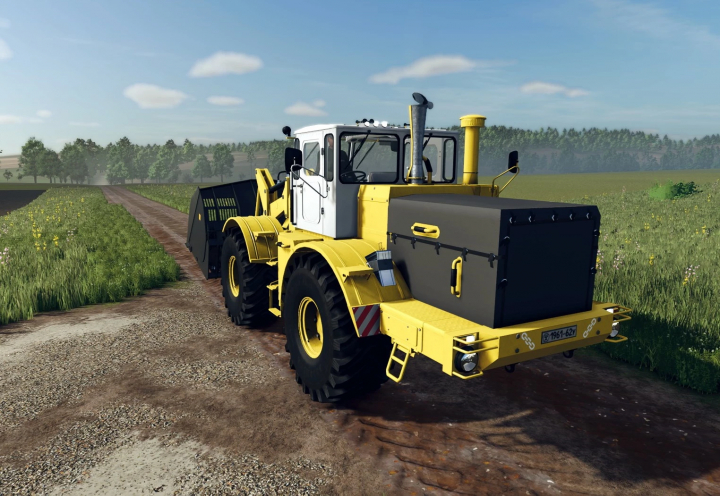 fs25-mods,  Kirovets K-700A PKU tractor mod in Farming Simulator 25, showcasing its robust design on a rural path.