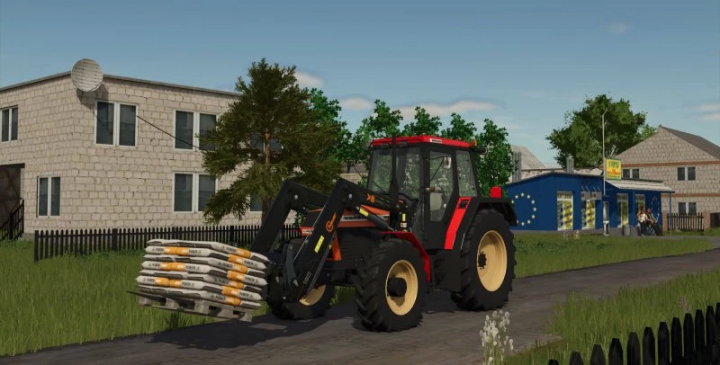 fs25-mods,  URSUS tractor with front loader on village road in FS25 mod URSUS PACK 1234-1734 v2.0.0.0.