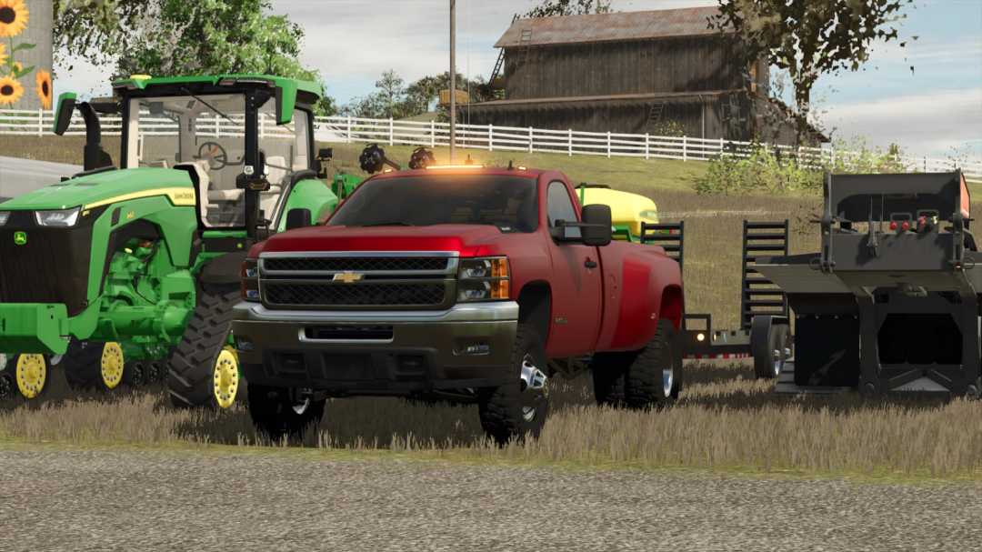 2010 Silverado Bubba Truck mod in FS25 next to farming equipment.