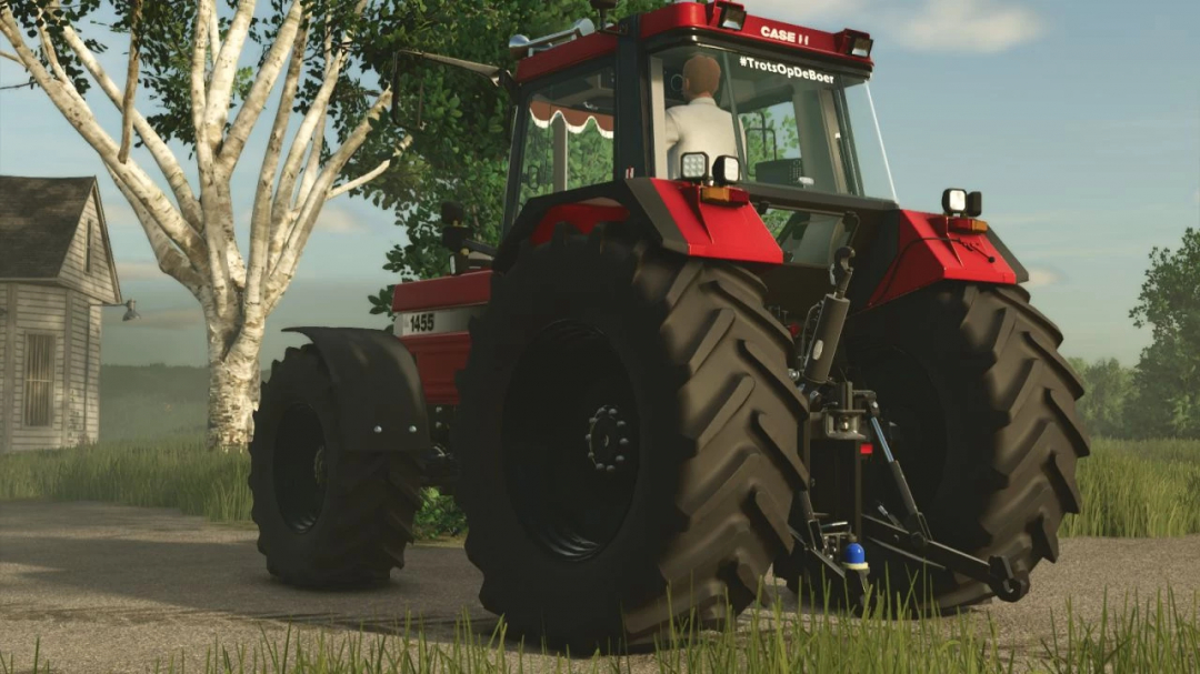 FS25 mod Case IH 1455XL Edit v1.0.0.0 showing a red tractor in a rural setting.