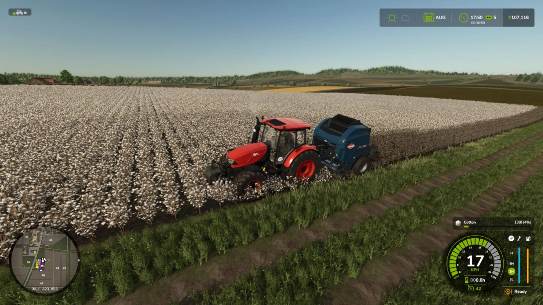 Tractor harvesting cotton field in Farming Simulator 25 using Cotton Production Pack mod.