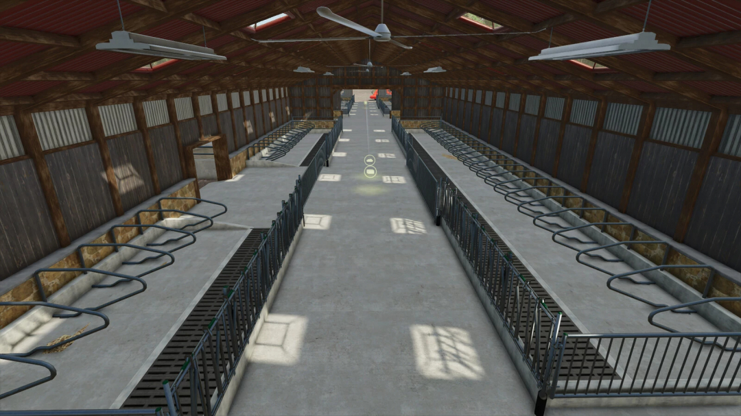 Interior of Cow Barn XL mod for FS25, showcasing spacious stalls and modern design.