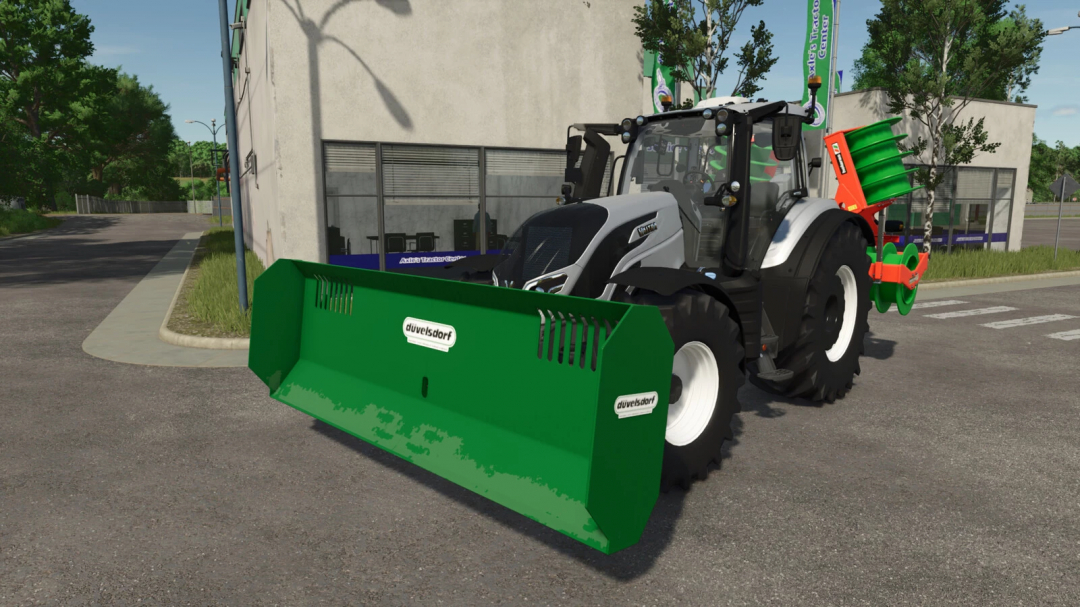 Düvelsdorf MSS3X00 mod in FS25 showing a tractor with front weight attachment.