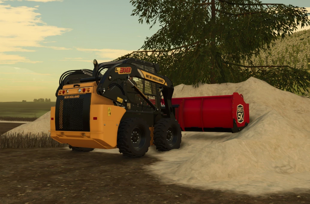 FS25 Boss SK Box Plow mod in Farming Simulator 25, attached to a New Holland loader, clearing a sand pile.