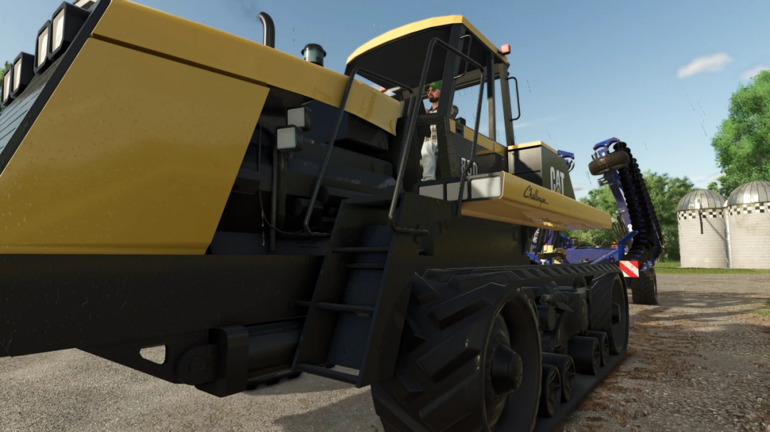 FS25 CAT C&D Series tractor mod in Farming Simulator 25, featuring detailed design and tracks.