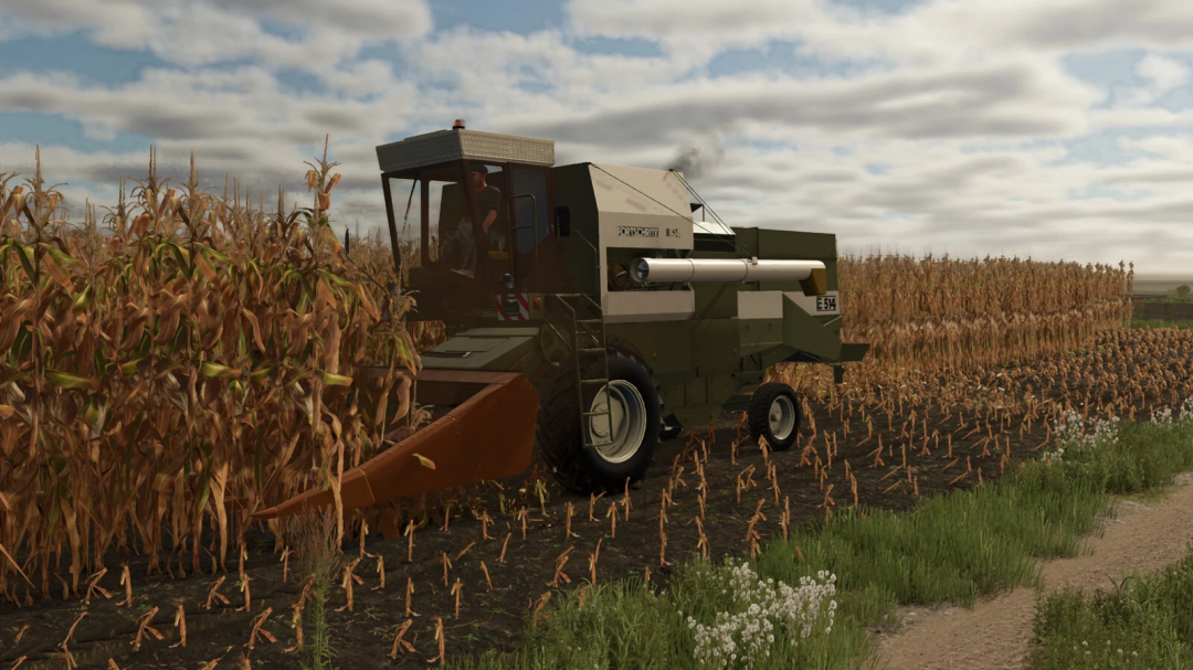 FS25 mod Fortschritt E-514 harvester in a cornfield, Farming Simulator 25 mods.