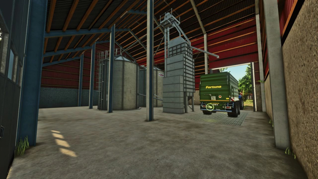 Interior of grain silo in FS25 mod v1.0.0.0 with truck unloading grains.