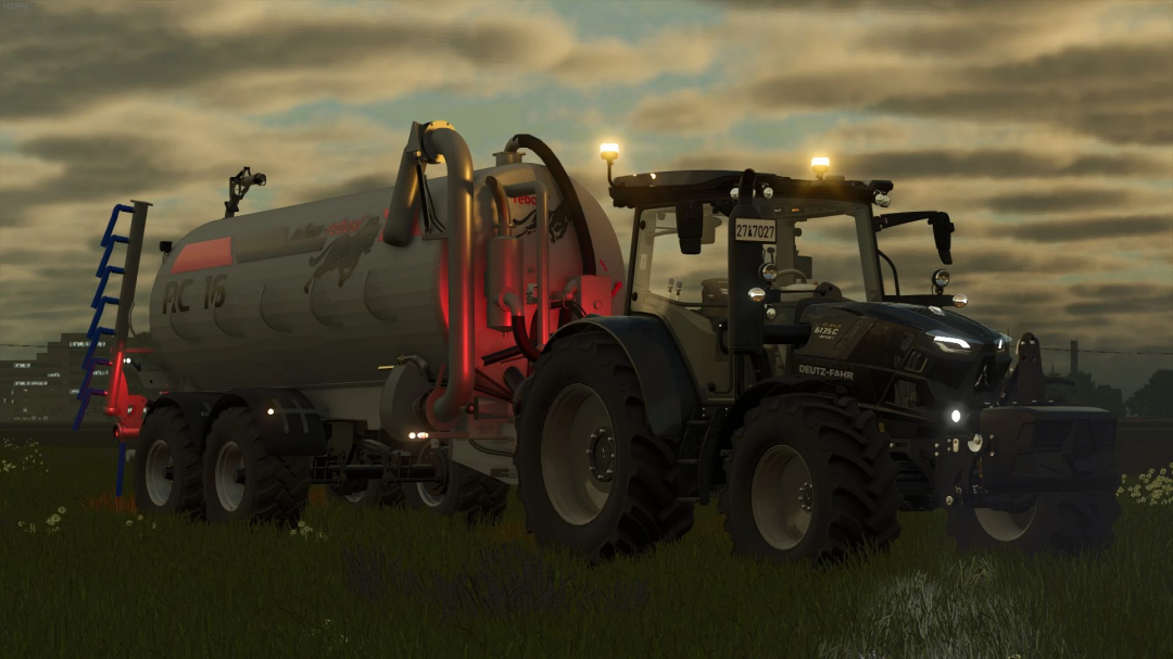 Night scene of Deutz-Fahr tractor with JA&MA Reboal RC-16 mod in FS25, showcasing illuminated equipment.