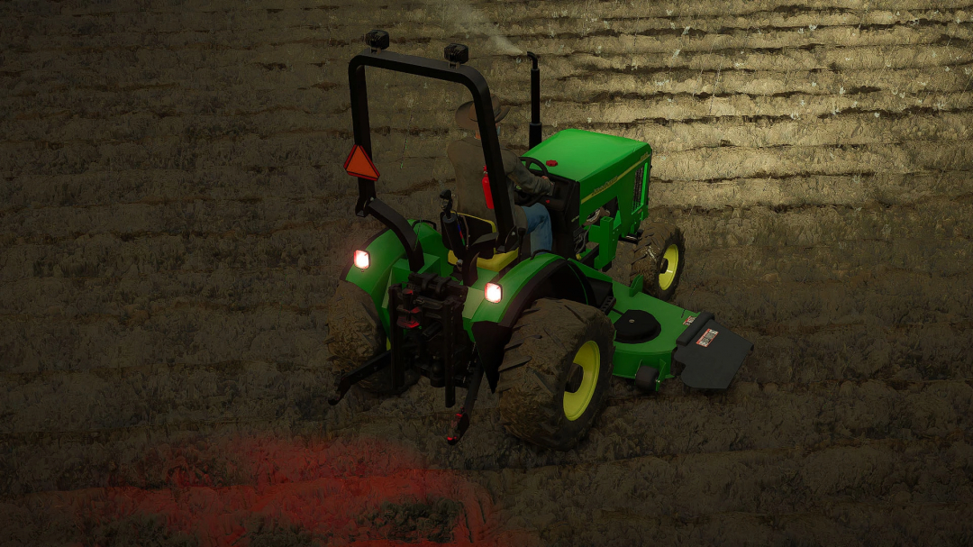 FS25 mod: John Deere 4100 Compact Tractor working on a field, rear view with lights on, in Farming Simulator 25.