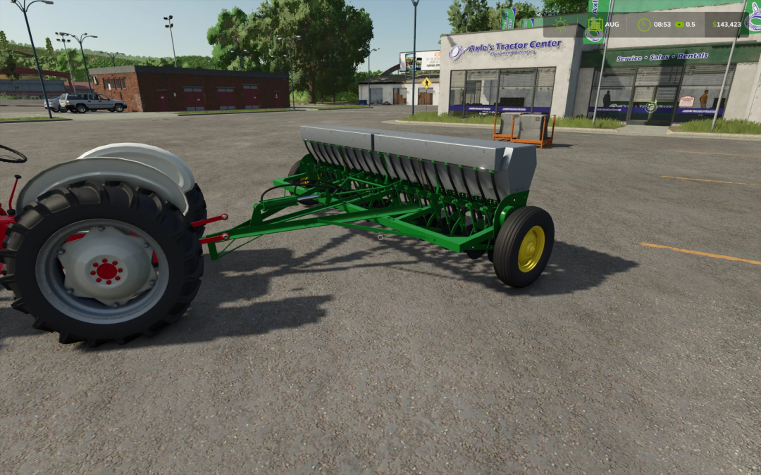 FS25 mod: John Deere Van Brunt model B drill in a parking lot, showcasing Farming Simulator 25 features.