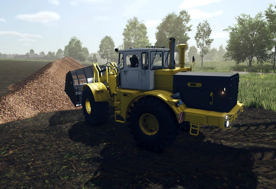 Kirovets K-700A PKU tractor mod in Farming Simulator 25, piling soil in a field.